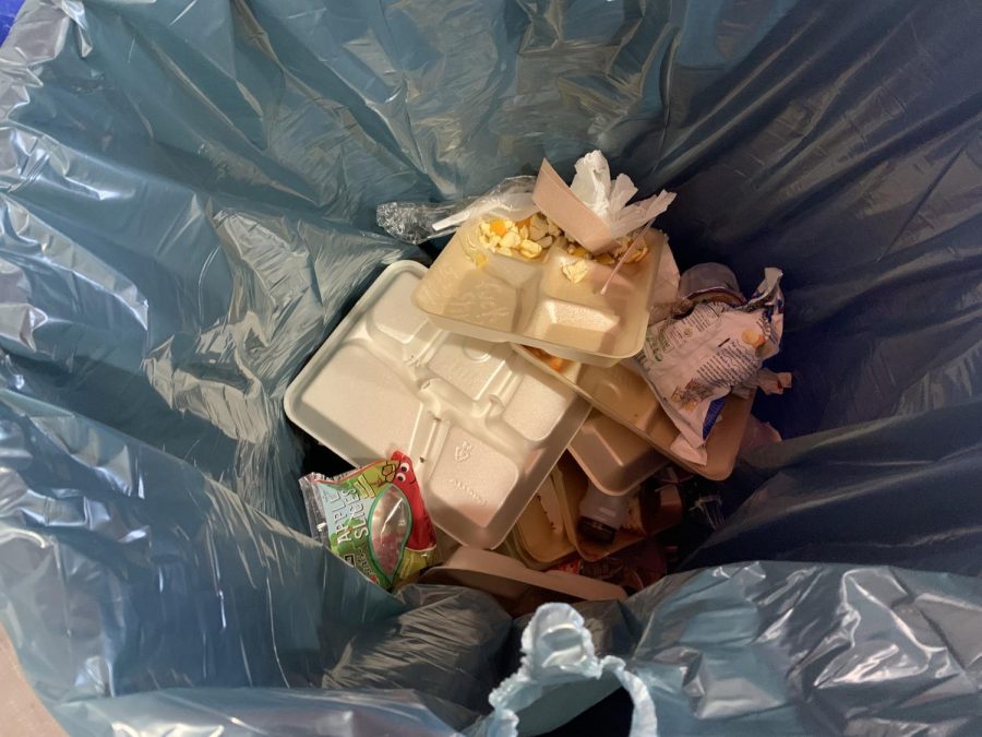 After lunch, the trash can is filled with styrofoam lunch trays, plastic bags, and paper containers. Reusable lunch trays have been used in the past, which minimized the amount of trash.