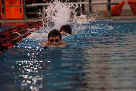 Boy swimming.