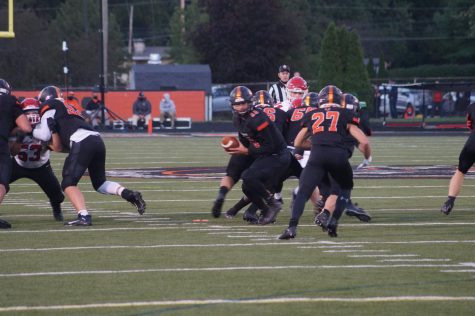 Junior Austin Dowell carrying the football