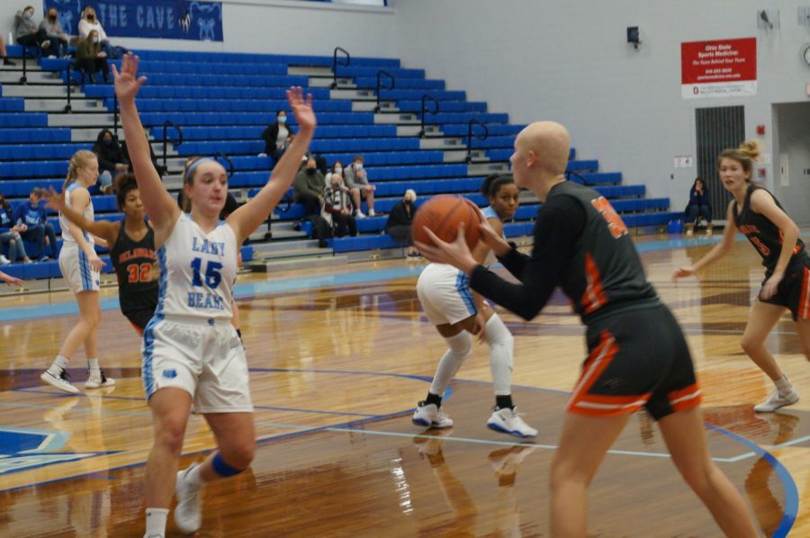 Hayes basketball player shoots the basketball.