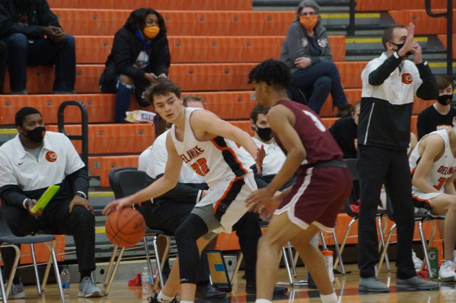 Hayes basketball player looks for another Pacer to pass the ball to.