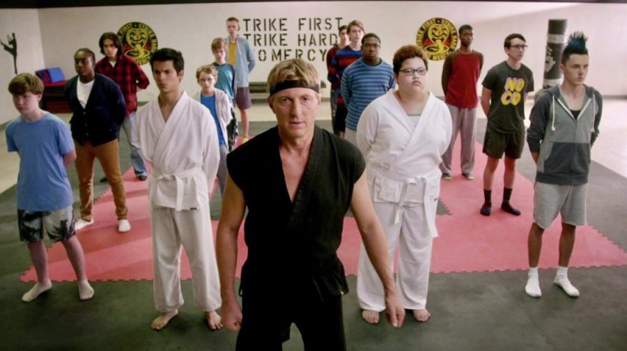 Johnny Lawrence (played by William Zabka) leads a karate class in his dojo, Cobra Kai.