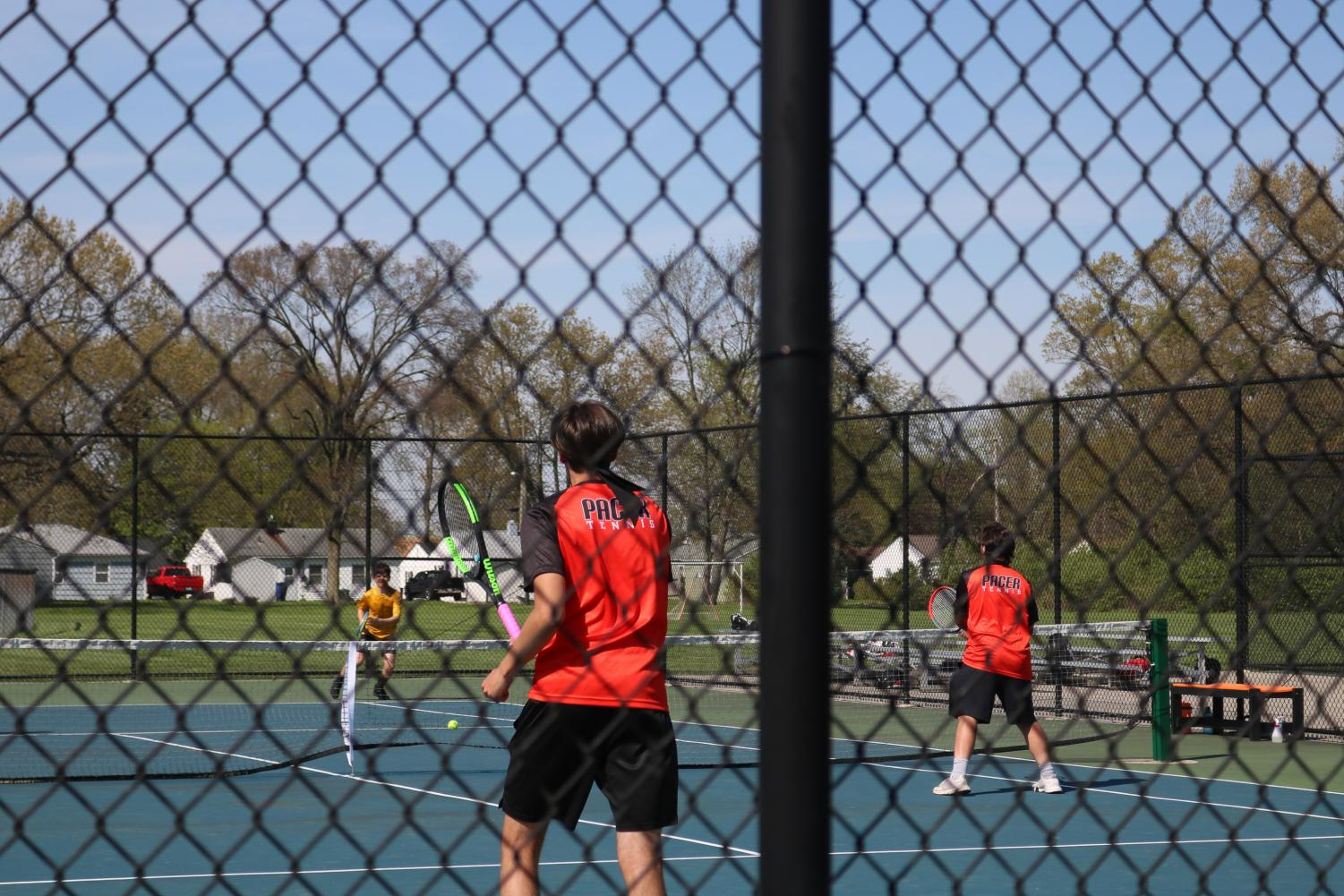 Lucas Nogueira Balaniuc and Ben Dabe wait for the ball.