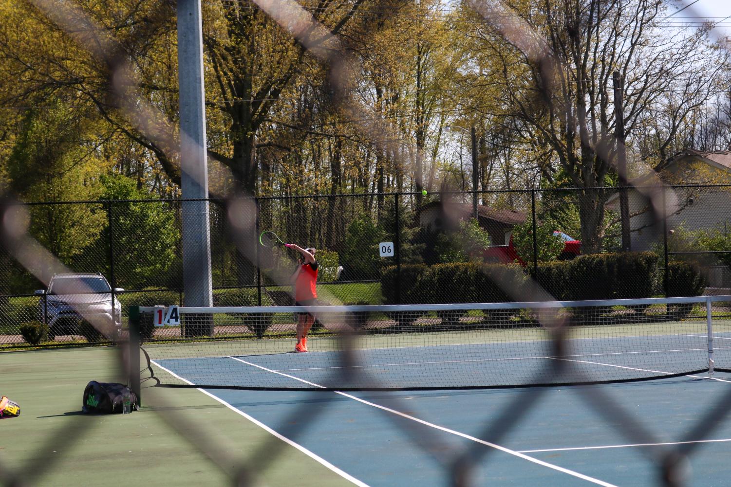 Gabe Fogel follows through a hit.