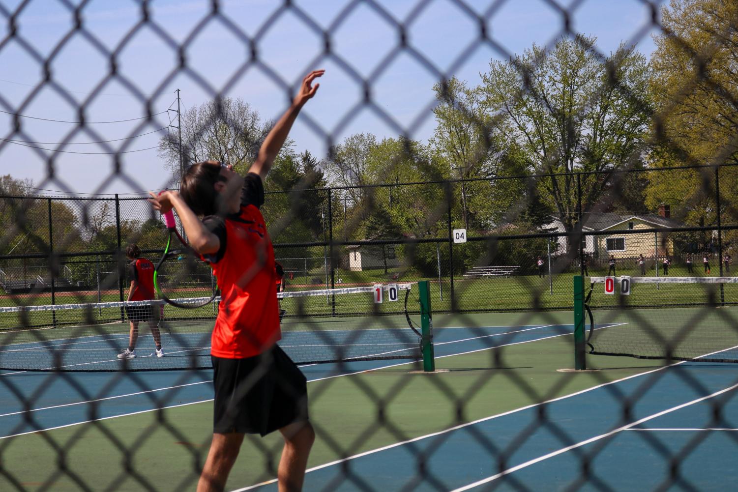 Lucas Nogueira Balaniuc serves.