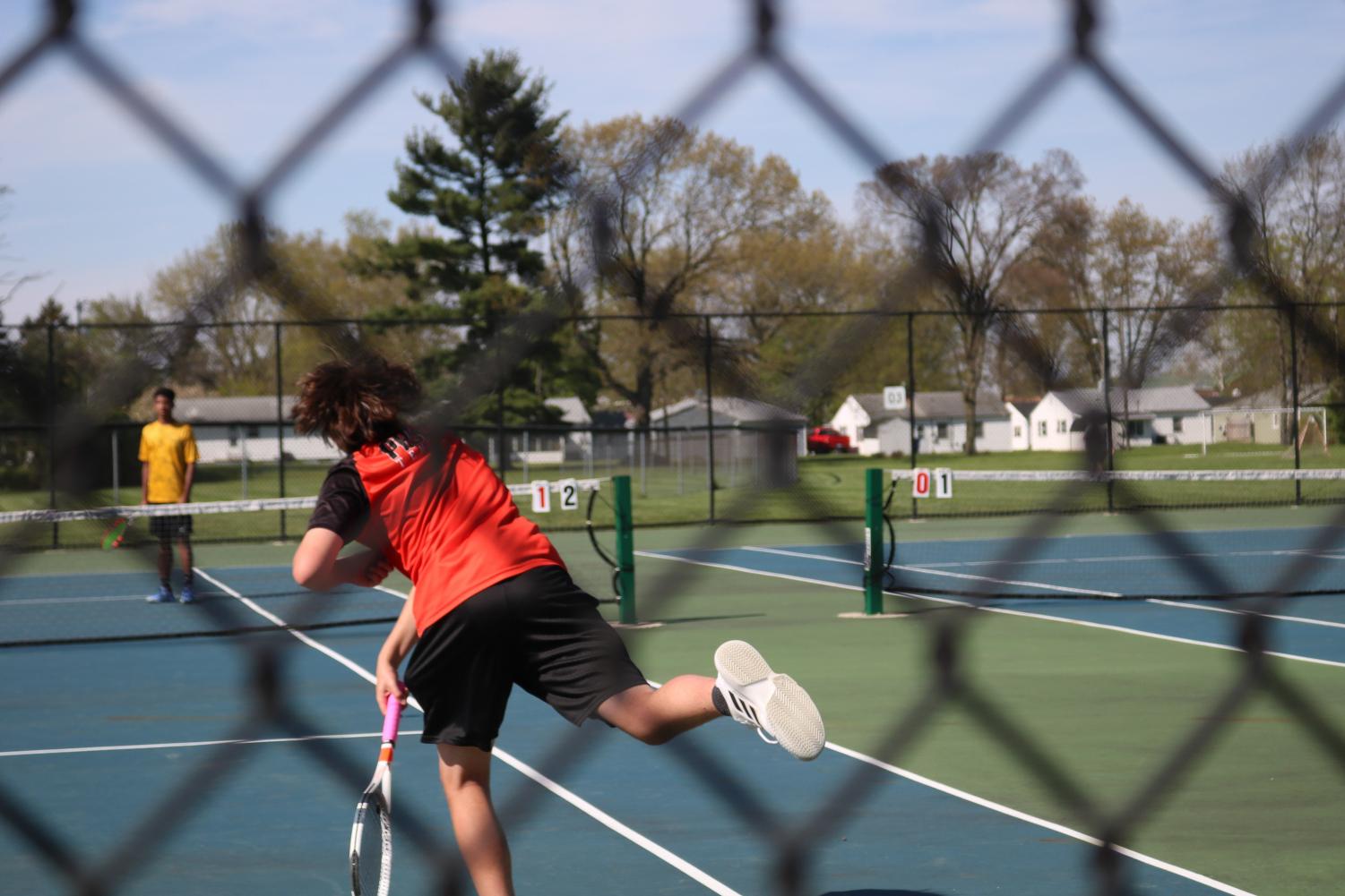 Grant LaMar follows through a hit.