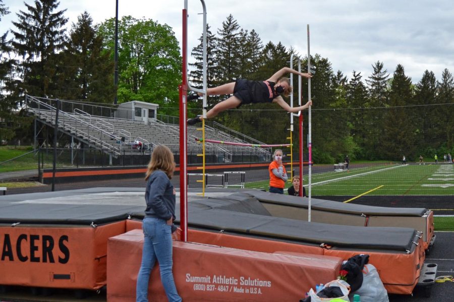 Senior Rebecca Young clears the bar.