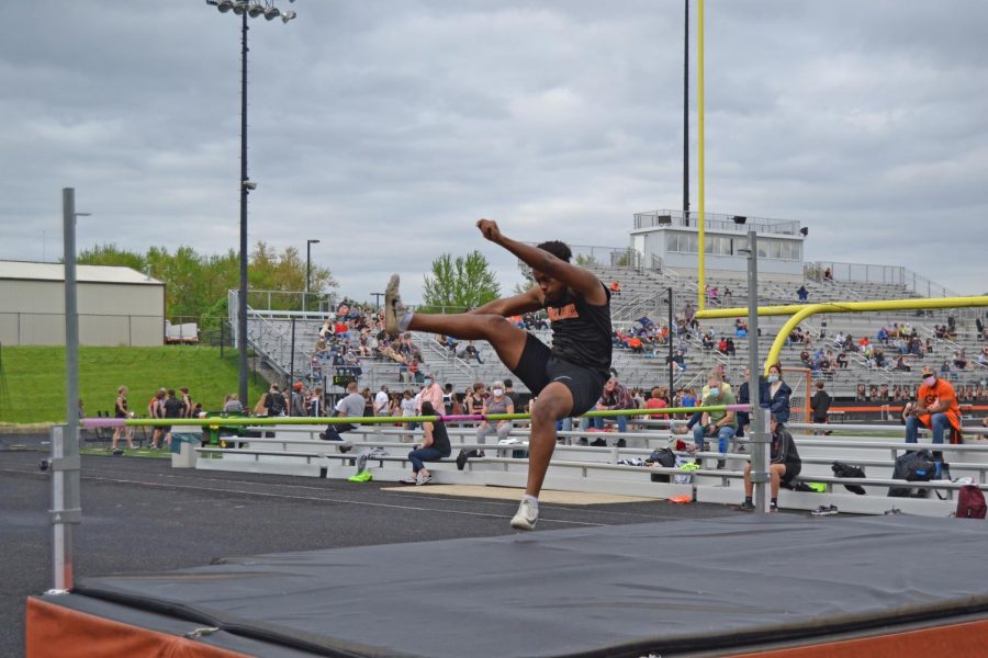 Senior Alex Blevins clears the bar.