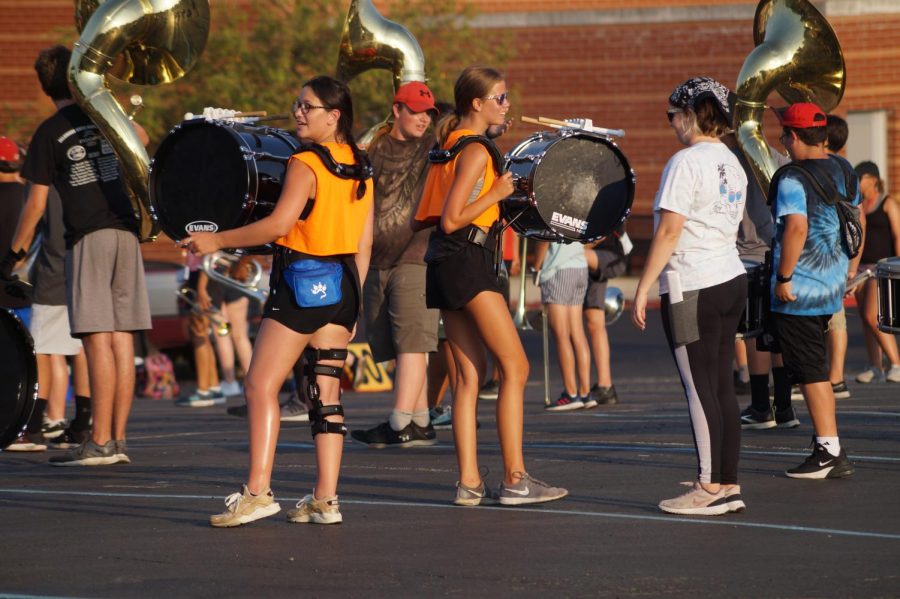 Reagan Connar and Lindsay Cooke bass drum players in between sets.