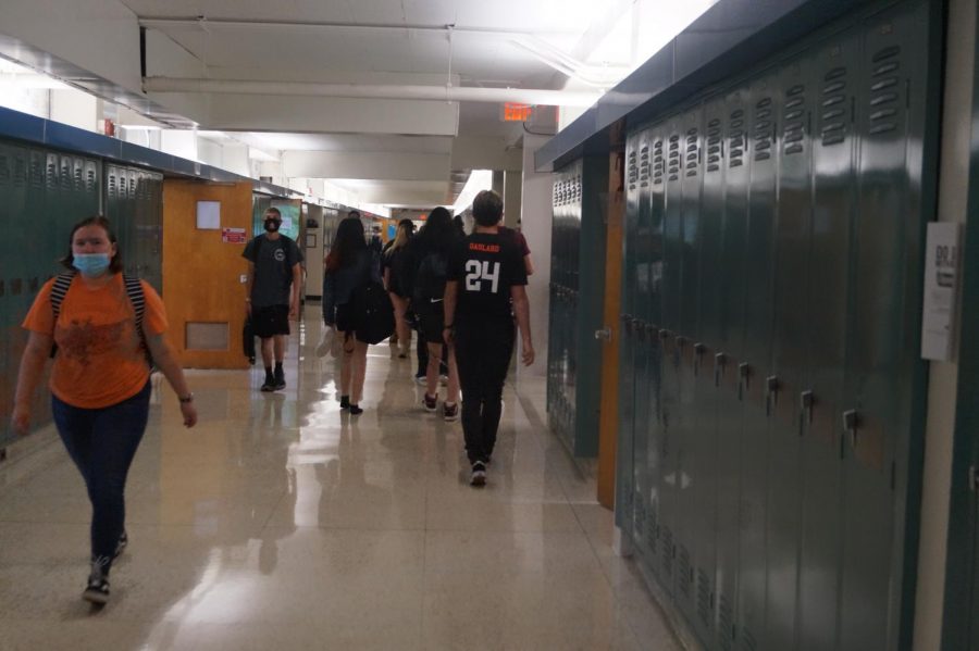 Students head to class before the bell rings. There are five minutes between every class to allow students time to navigate the halls.