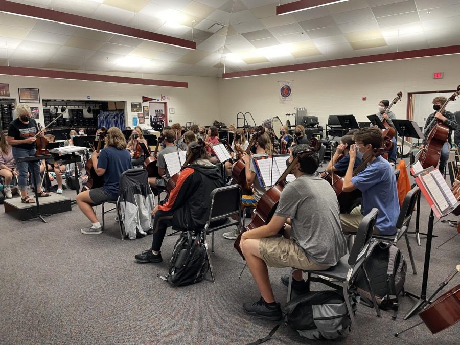 Hayes symphony orchestra practices during the school day. The orchestra and choir are planning a joint trip to NYC this spring.