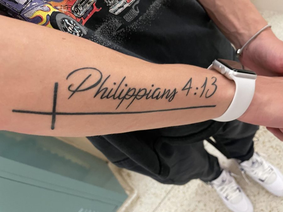 Senior Eli Watts got a bible verse tattoo on his arm.