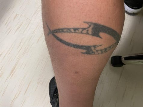 Math teacher Josh Lamb got his first tattoo on his leg. 