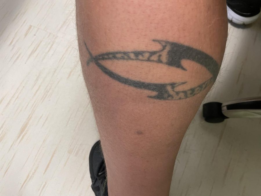 Math teacher Josh Lamb got his first tattoo on his leg.