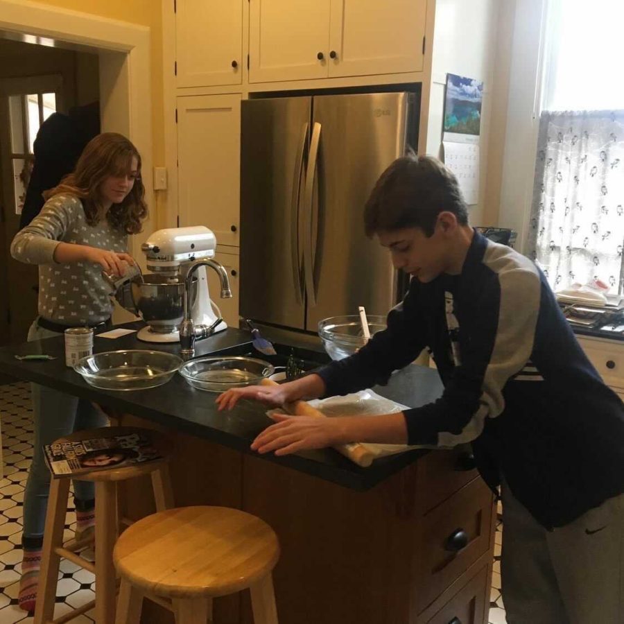 Senior Katie Hejmanowski and their brother, freshman Nick Hejmanowski make pies at their great grandma’s house on pie day.