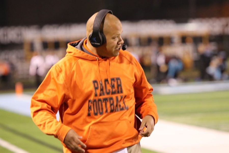 Ryan Montgomery coaches from the sideline during the 2021 football season. Montgomery was announced as the new head coach for the Pacers in early February.