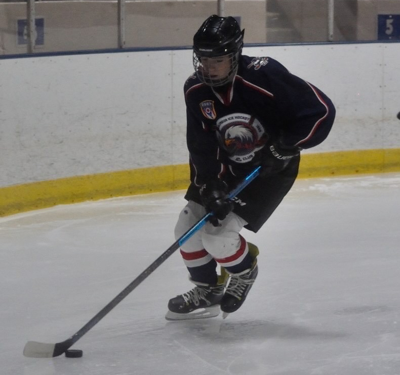 Sophomore Nate Richardson plays for the Columbus Ice Hockey Club.