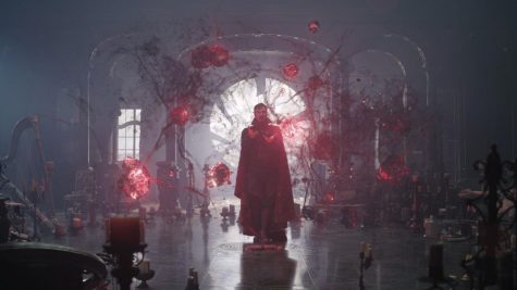 Doctor Strange (Benedict Cumberbatch) searches through universes in Doctor Strange in the Multiverse of Madness. The film is now playing in theaters.