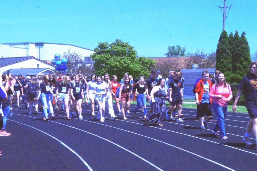 Seniors take their first couple steps on the track.