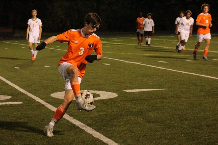 Junior Christian Cook receives a pass during the soccer game against Franklin Heights.
