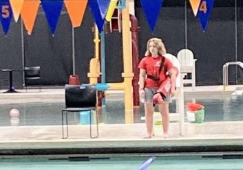 Junior Caiya Combs works as a lifeguard at the Delaware YMCA.