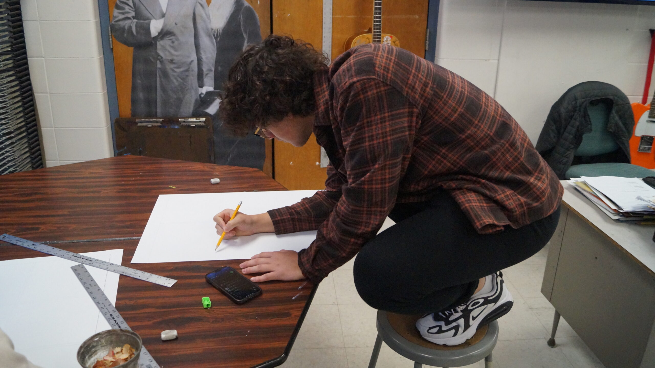 Junior Chris Eden works on an assignment in Jim Biblers drawing class.  Hayes has four full-time art teachers and offers over 20 different art courses.
