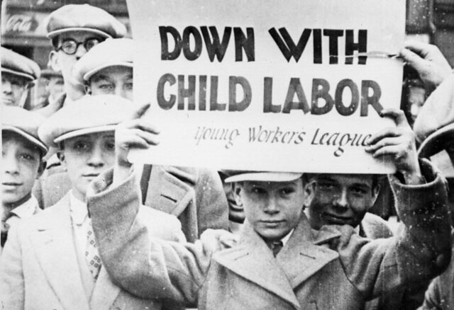 Child laborers during the early 1900s movements for workers rights hold picket signs in protest. Recently, there is a concerning movement advocating for the loosening of child labor laws in the U.S.