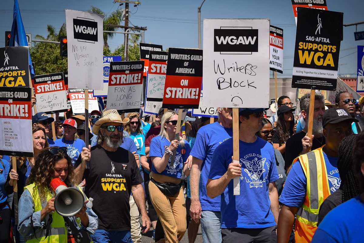 WGA union members hold the picket line on a sunny day in Los Angeles, California.