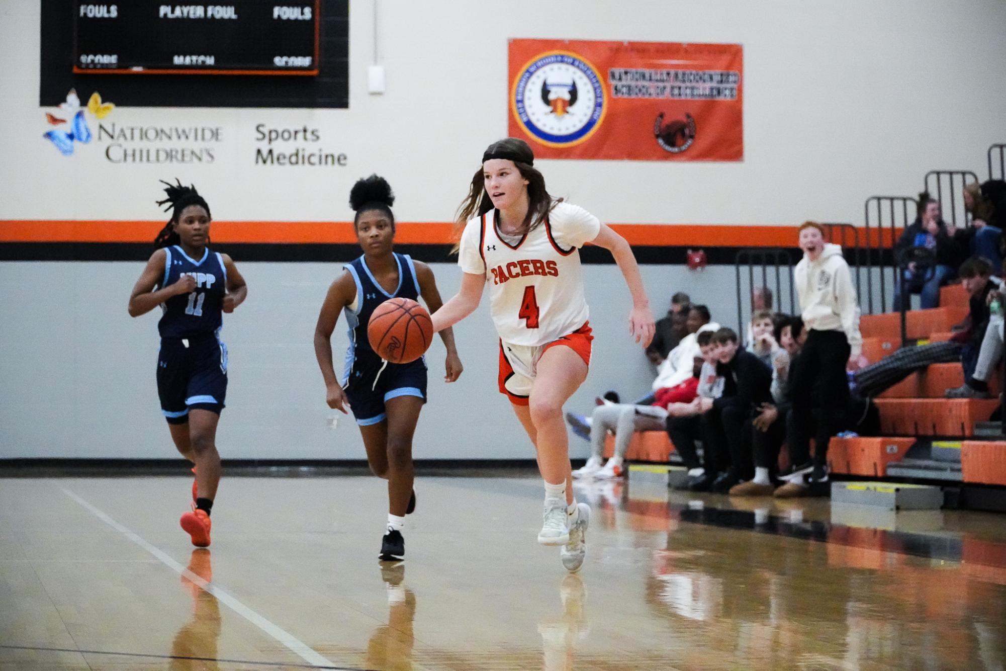 Laaksonen makes a break for the basket.