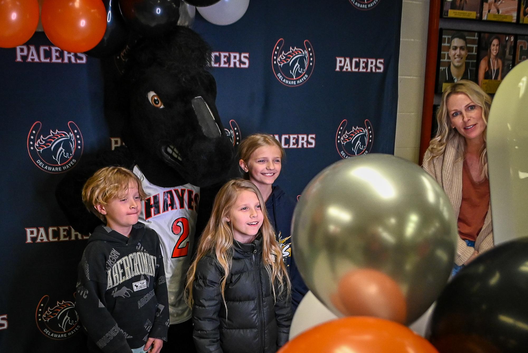 Families pose with the Pacers mascot for pictures before the Pacer Fest.