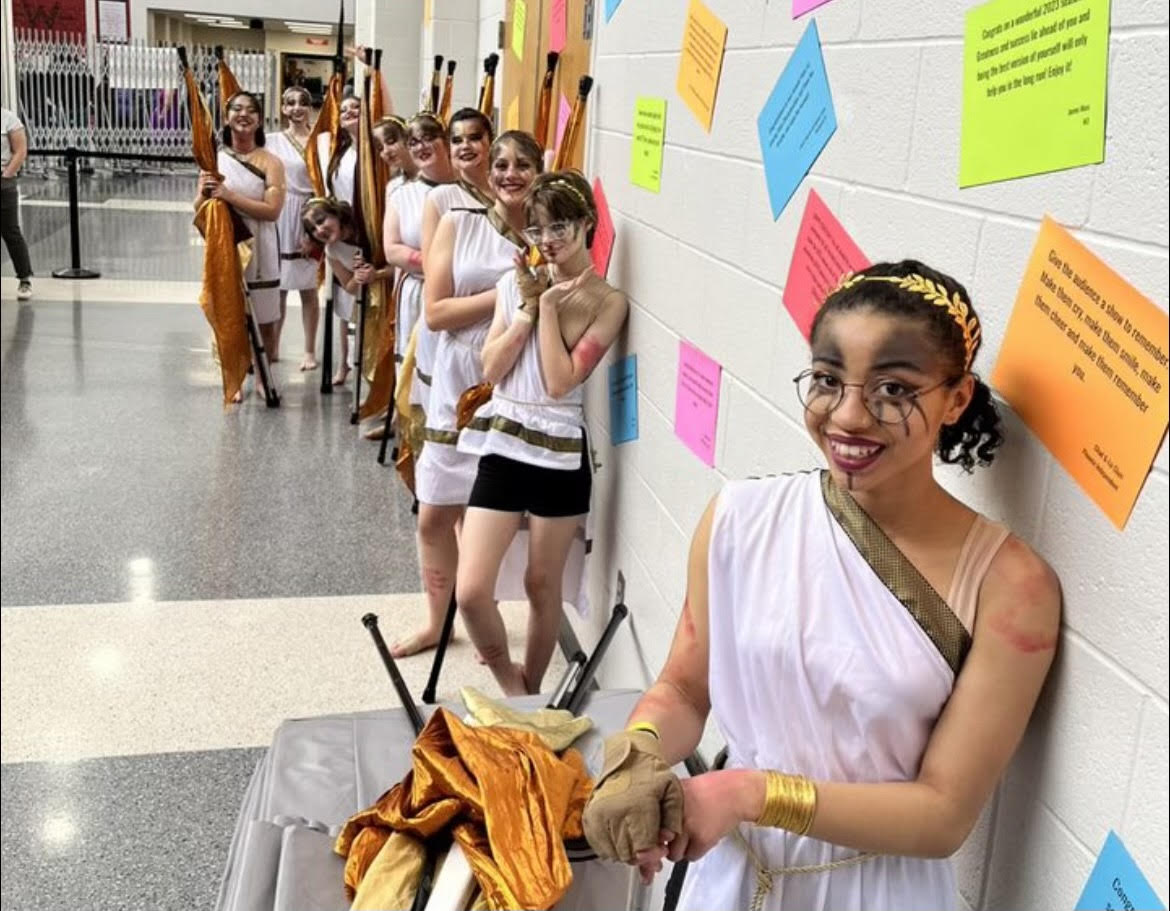 Last years Winter Guard team prepares for the 2022 state competition.