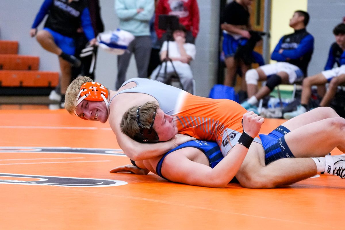 Frye pins his opponent to end the match.