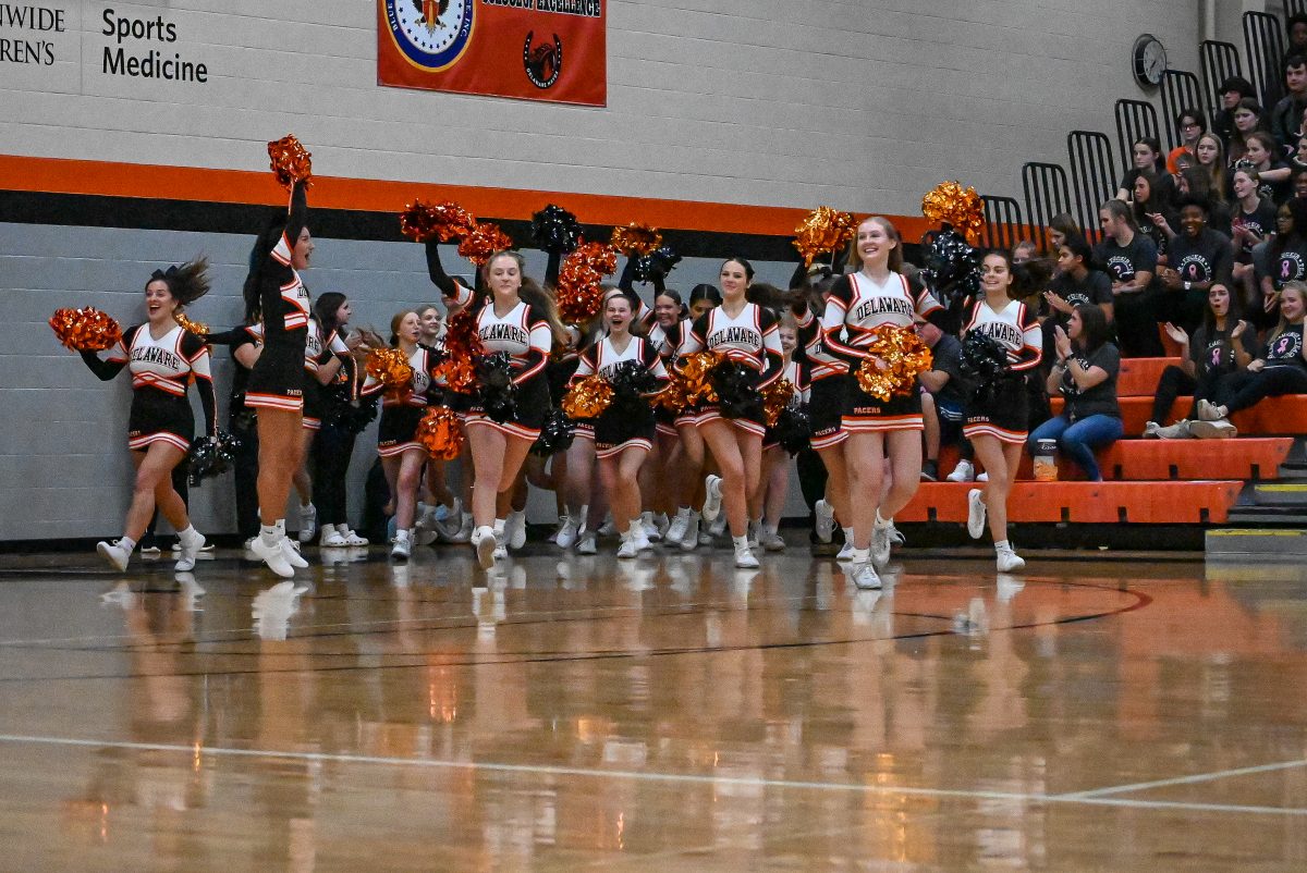 Cheerleaders coming out during the beginning of Pacer Fest.