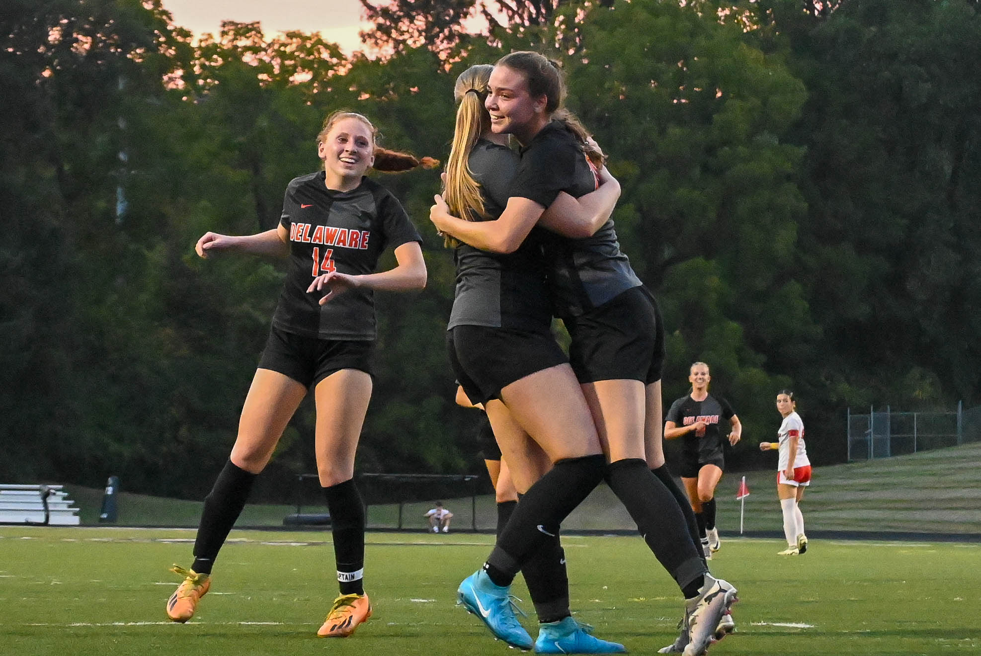 Senior Madeline Bruns and Senior Elise Buckerfield hug after a Pacer goal.