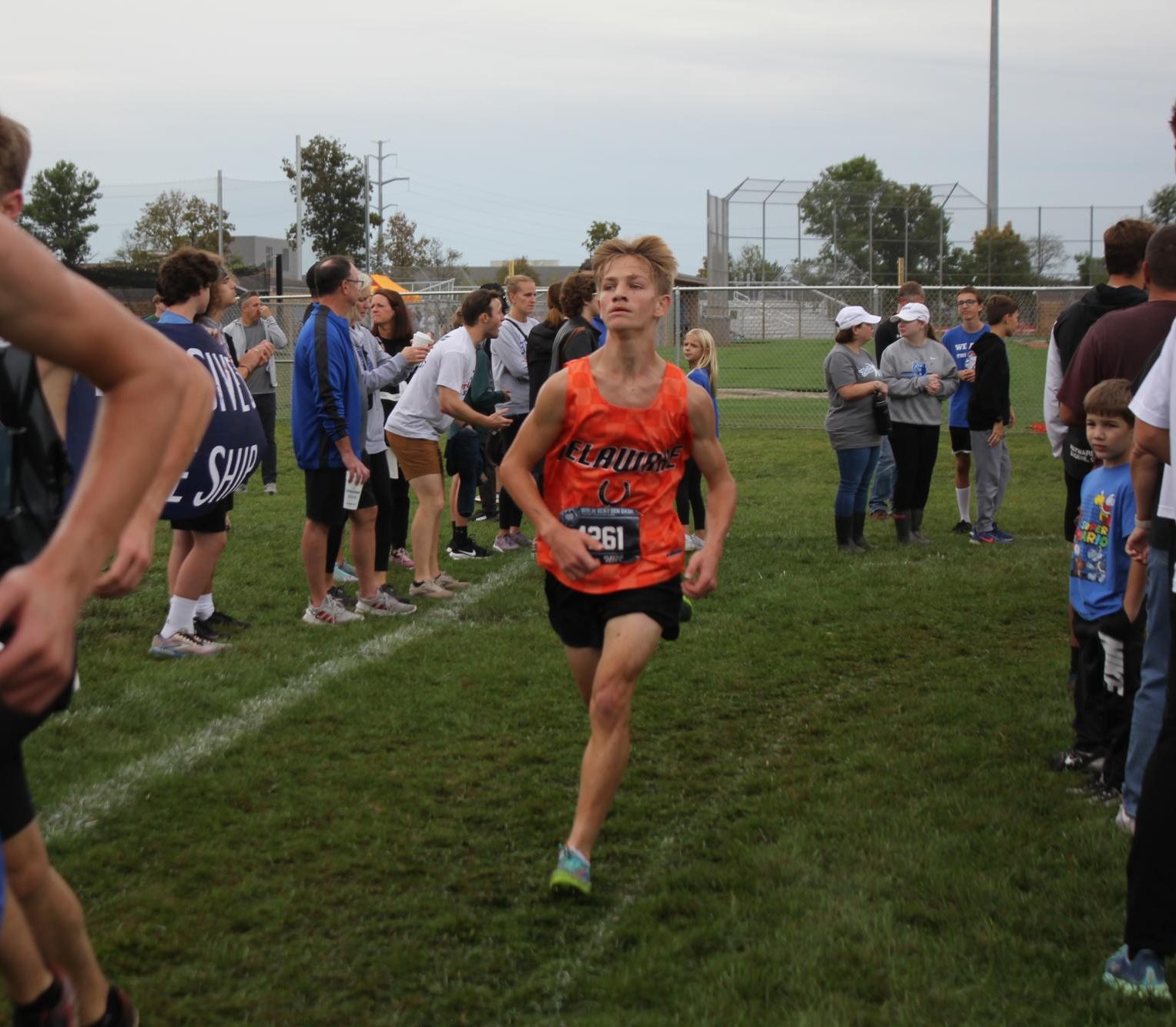 Varsity runner catches speed towards the end.