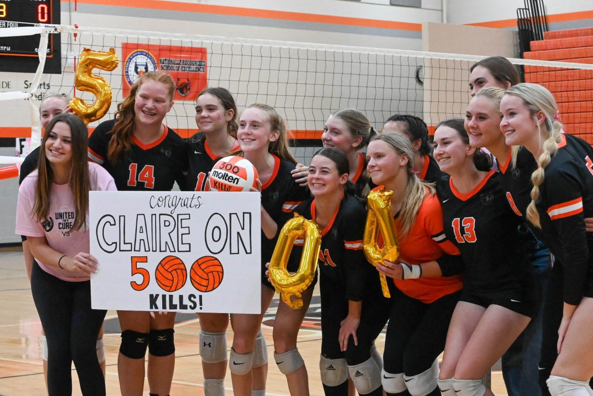 Davis and the team celebrate her 500th kill.