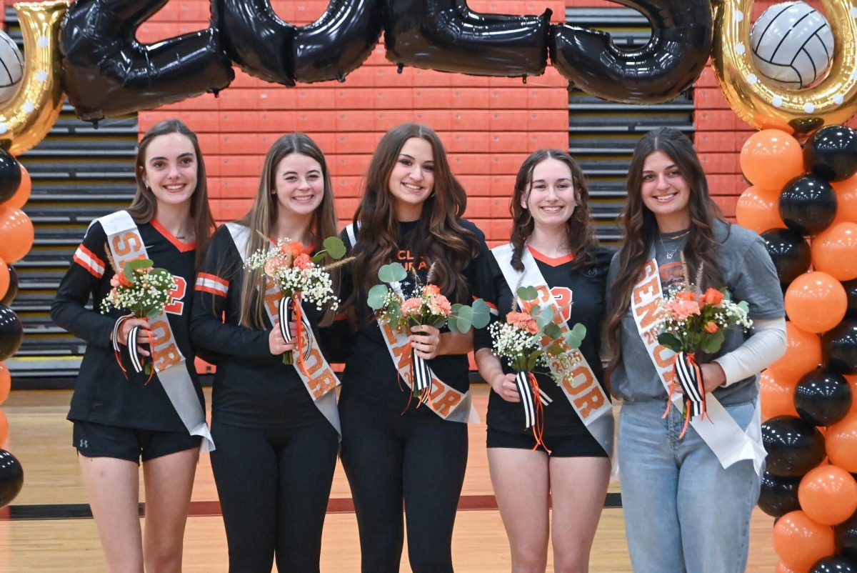 The senior players pose for a picture.