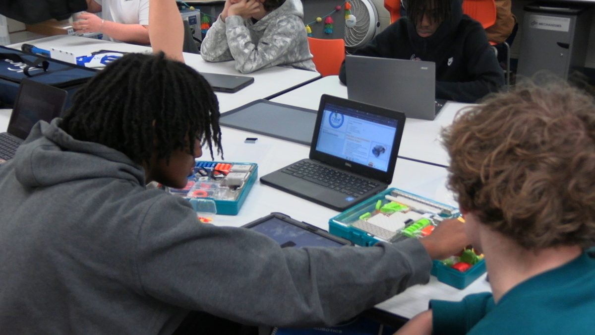 Students in the Career Opportunities class learn about robotics in one of their modules.