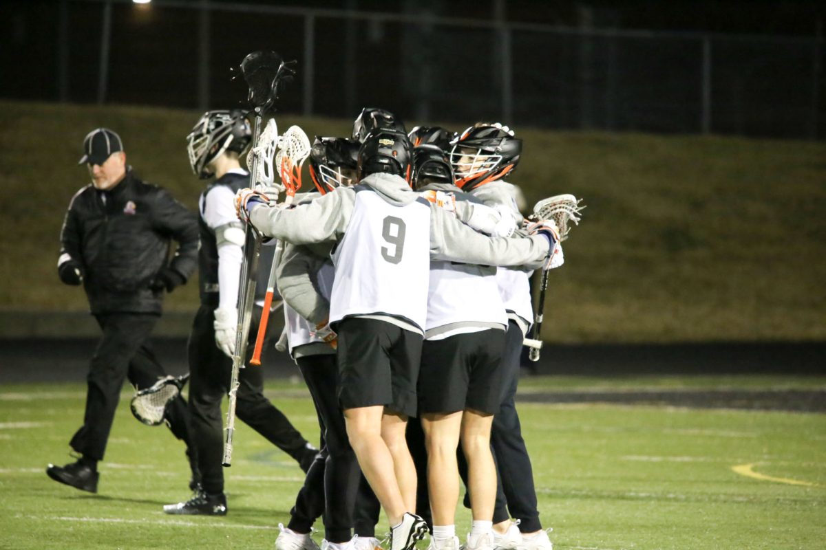 The Pacers celebrate after Sophomore Owen Willis scored the first goal of the season.