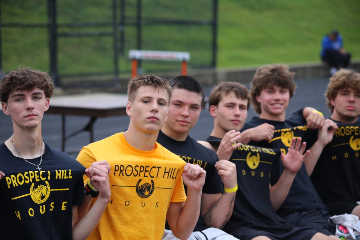 Students from Prospect Hill pose for a picture after a game of 7 on 7 football.