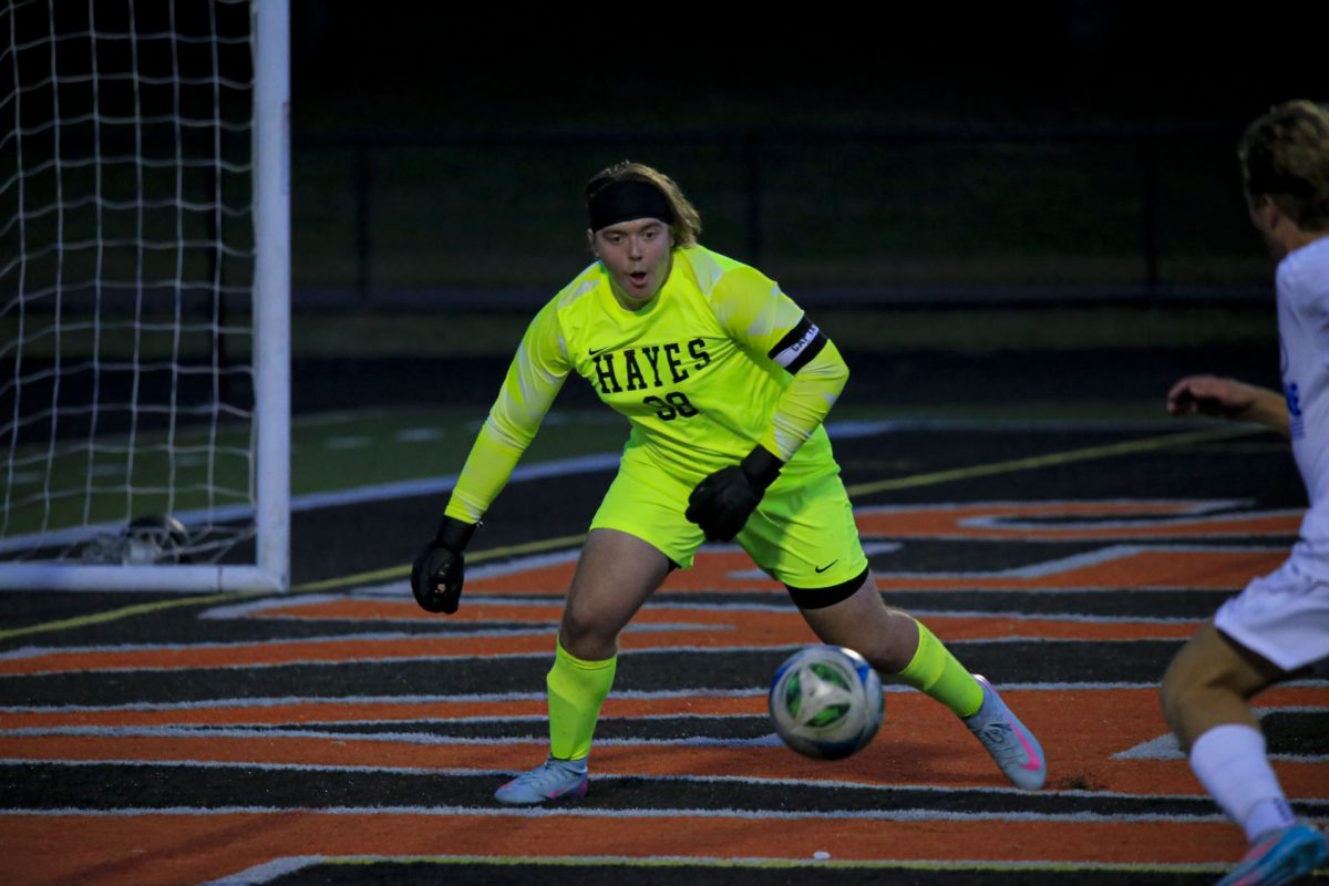 Senior Colin Waselko prepares to make the save.