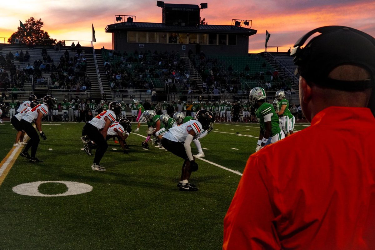 Coach Colt Tanner watches the defense.