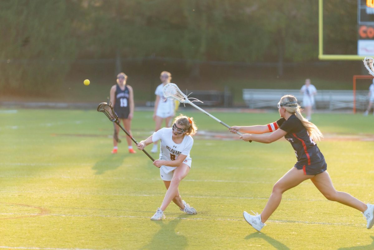 Sophomore Addy Van Gundy takes a shot in front of the goal.