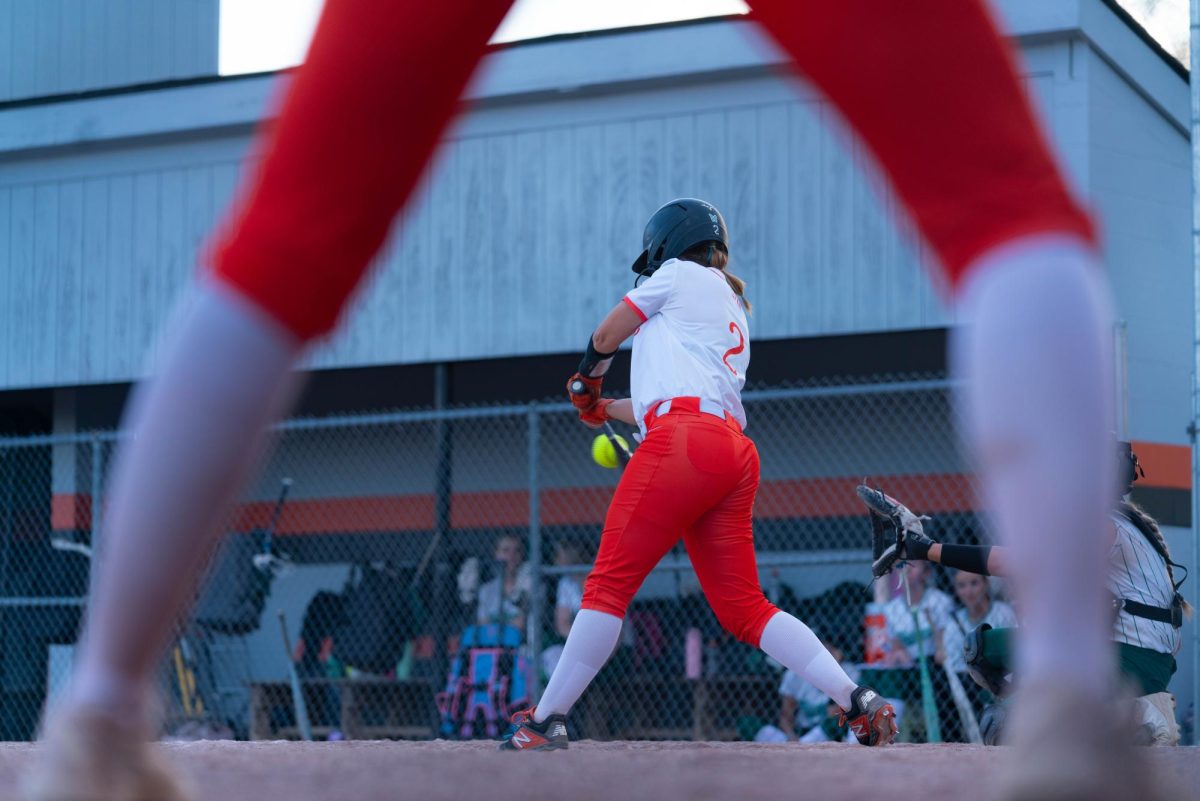 Senior Kate Shipp hits a single to left field.