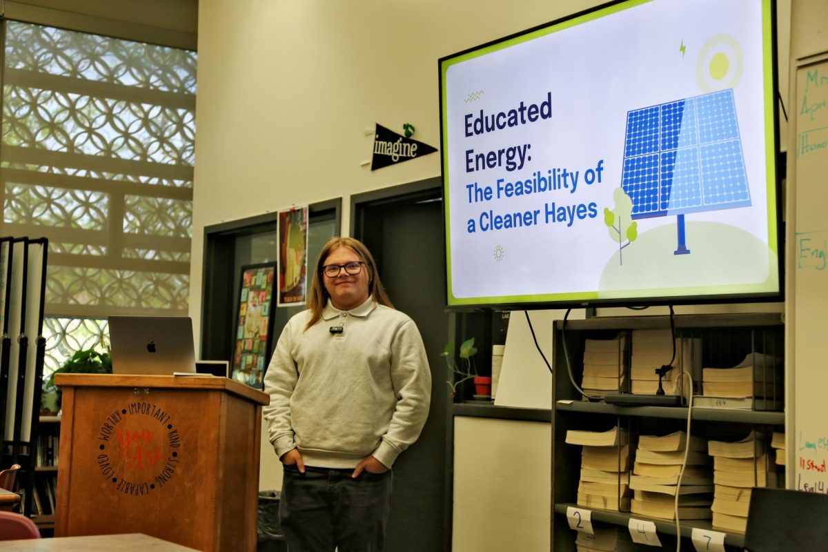 Senior Charlie Dilbeck prepares for his presentation about retrofitting Hayes with solar panels. 
