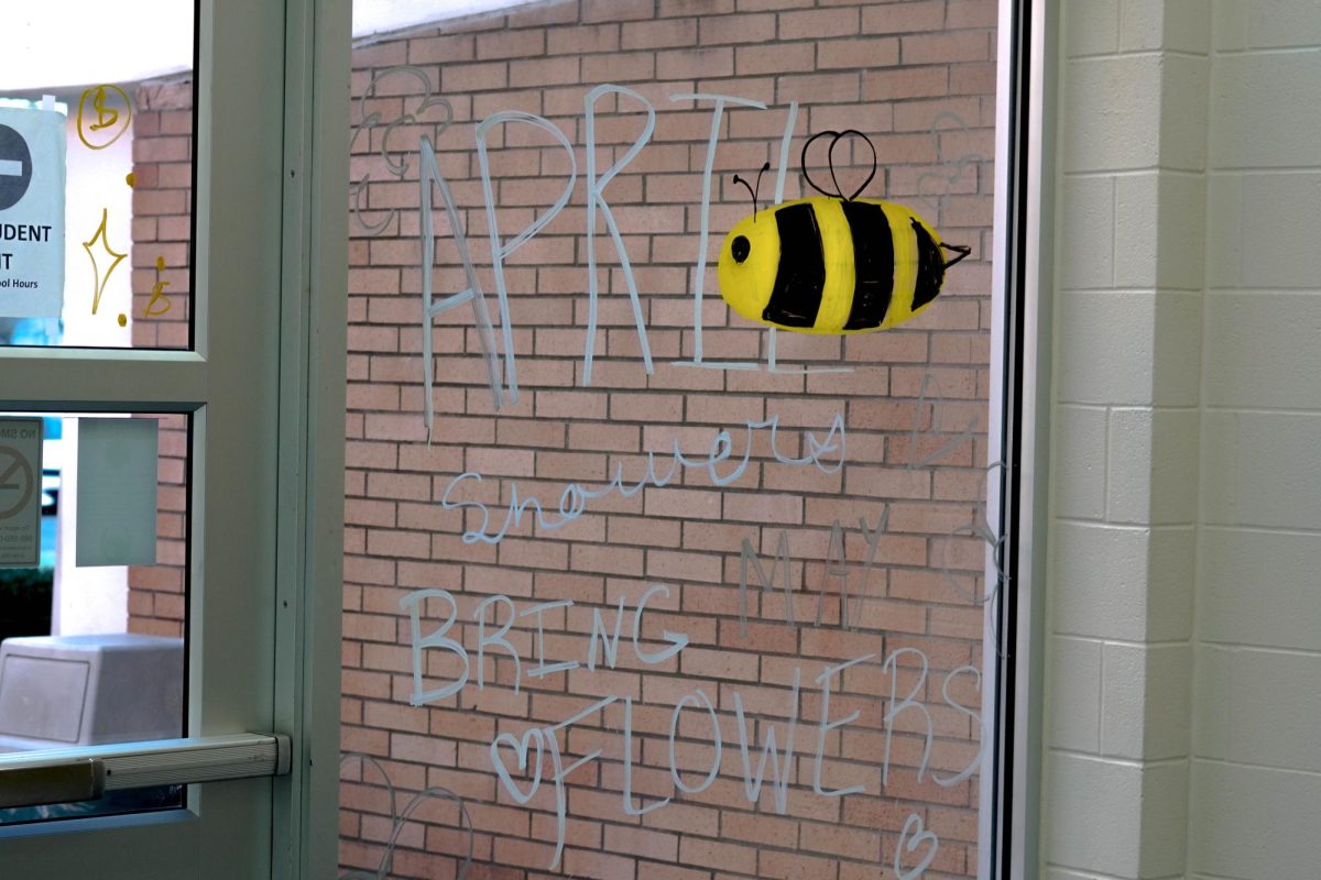 The Beautification Committee starts off April with new window art.