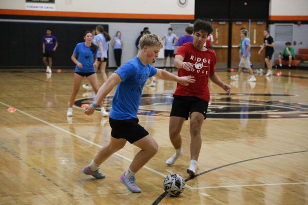 Freshman Reid Stultz avoids the defender to get to the goal.